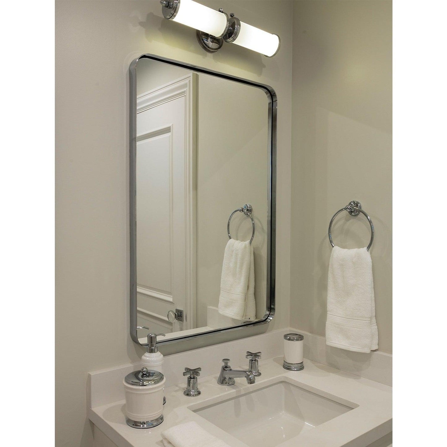 Mirror Home 26" x 42"Hand welded stainless steel bathroom mirror finished in burnished brass.