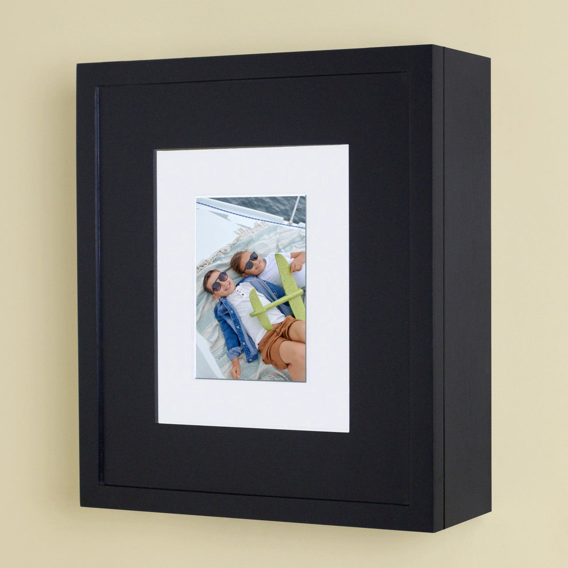 Fox Hollow Furnishings 15" x 13" Black Compact Wall Mount Picture Frame Medicine Cabinet With Mirror and Ivory 5" x 7" Matting