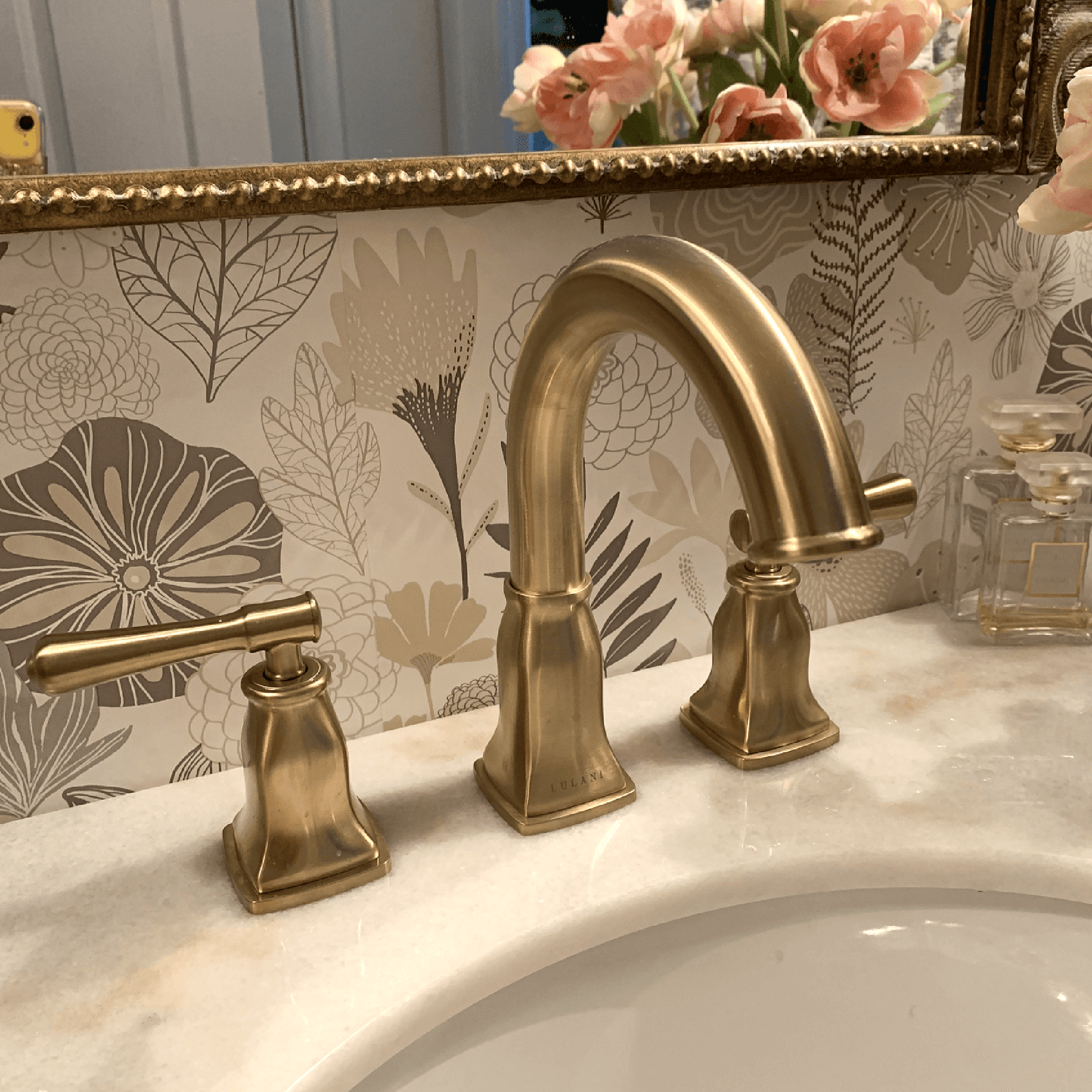 Lulani Aurora Champagne Gold 1.2 GPM Double Handle Widespread Brass Faucet With Drain Assembly