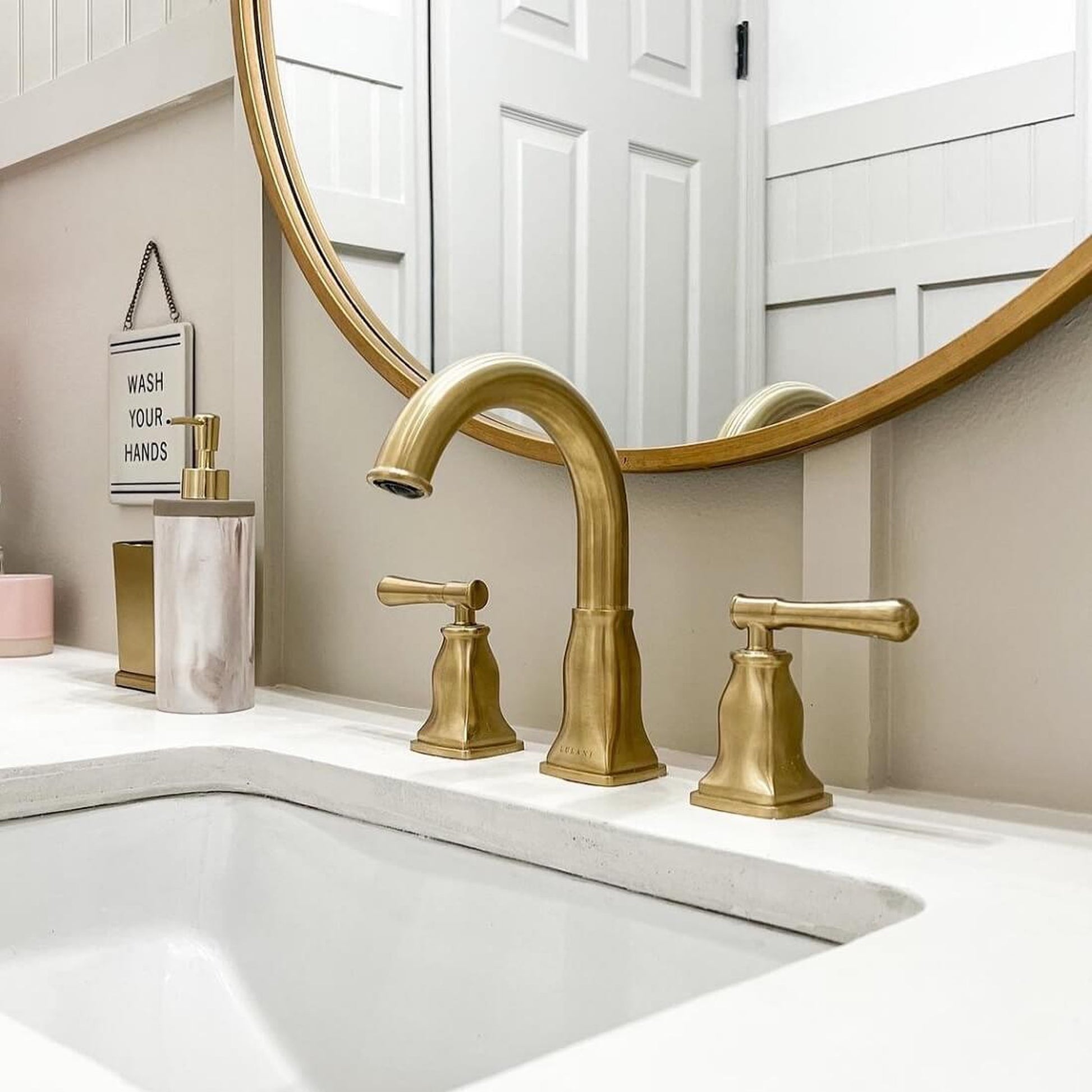 Lulani Aurora Champagne Gold 1.2 GPM Double Handle Widespread Brass Faucet With Drain Assembly