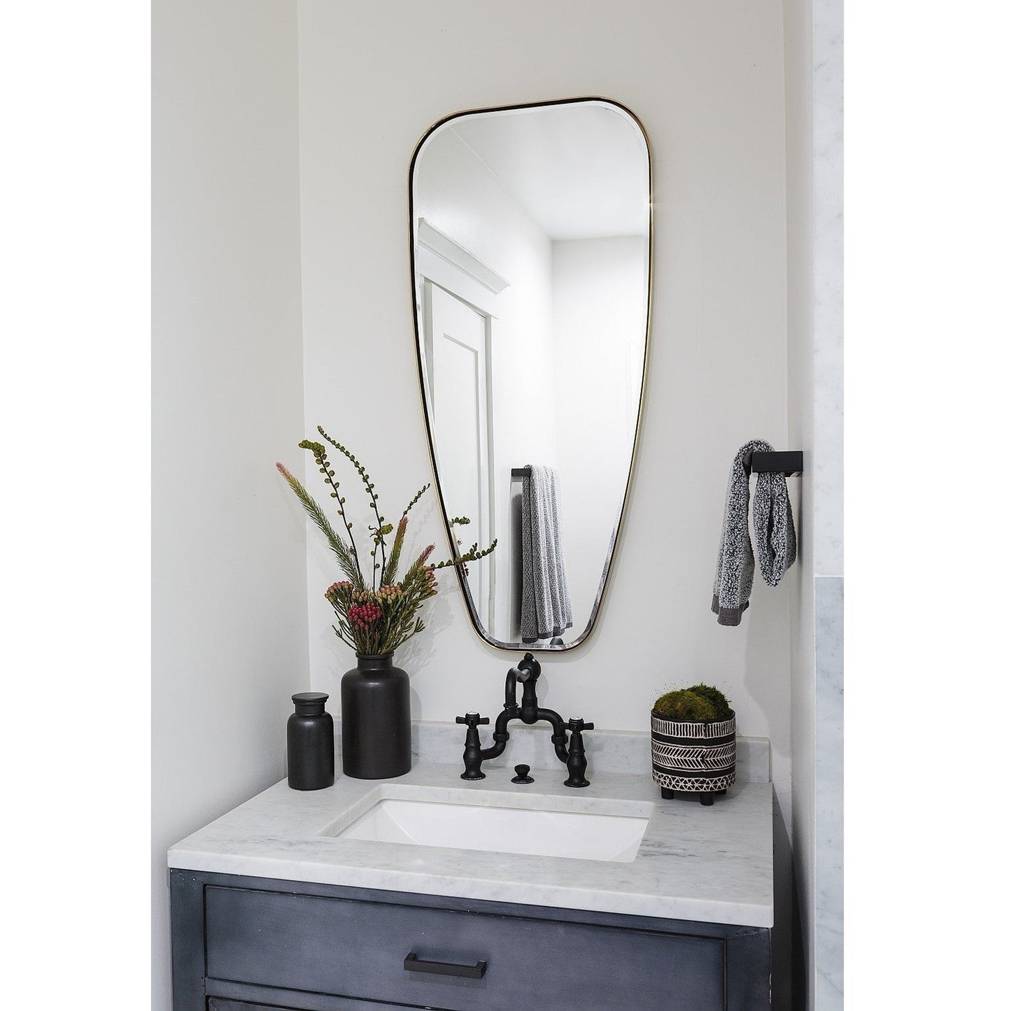 Mirror Home 19" x 42"Hand welded polished stainless steel bathroom mirror finished in burnished brass.