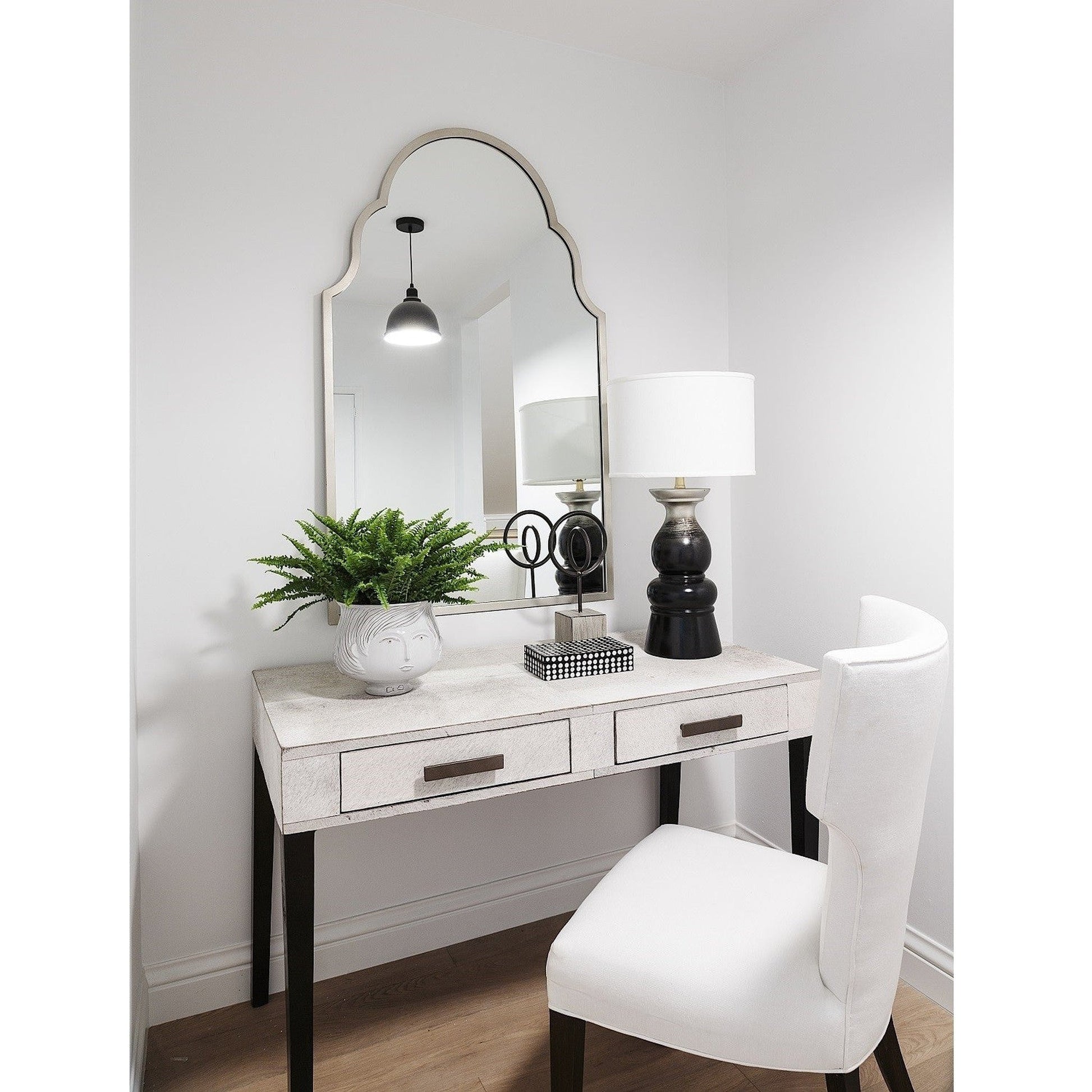 Mirror Home 32" x 52" Hand welded iron arc bathroom mirror finished in antiqued silver leaf.