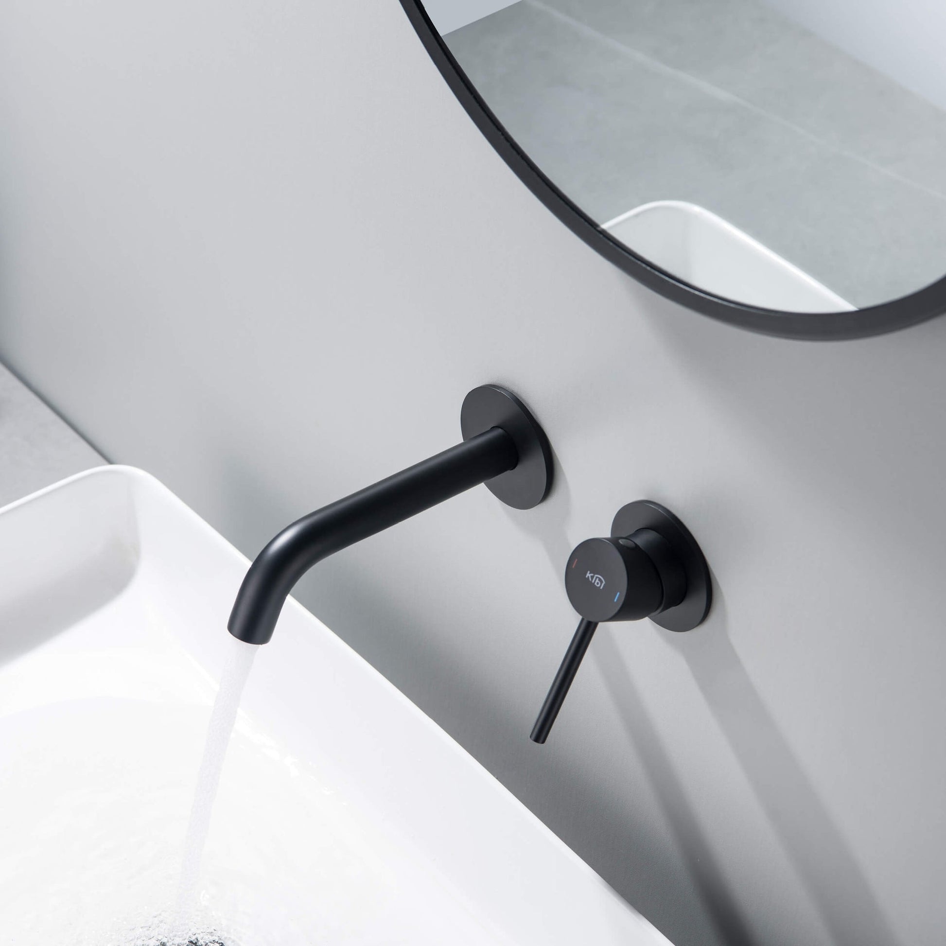 KIBI Circular Wall Mounted Single Handle Matte Black Solid Brass Bathroom Sink Faucet
