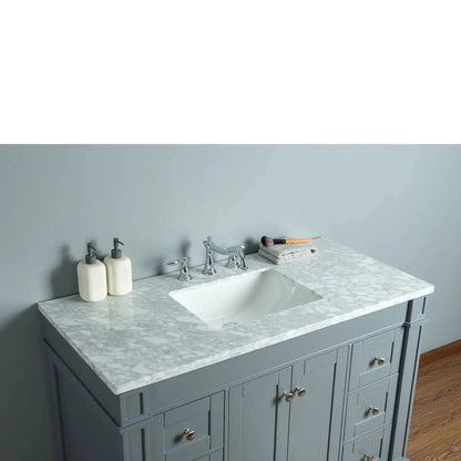 Stufurhome Seine 48" Grey Freestanding Bathroom Vanity With Rectangular Single Sink, White Carrara Countertop, 6 Drawers, 2 Doors and Widespread Faucet Holes