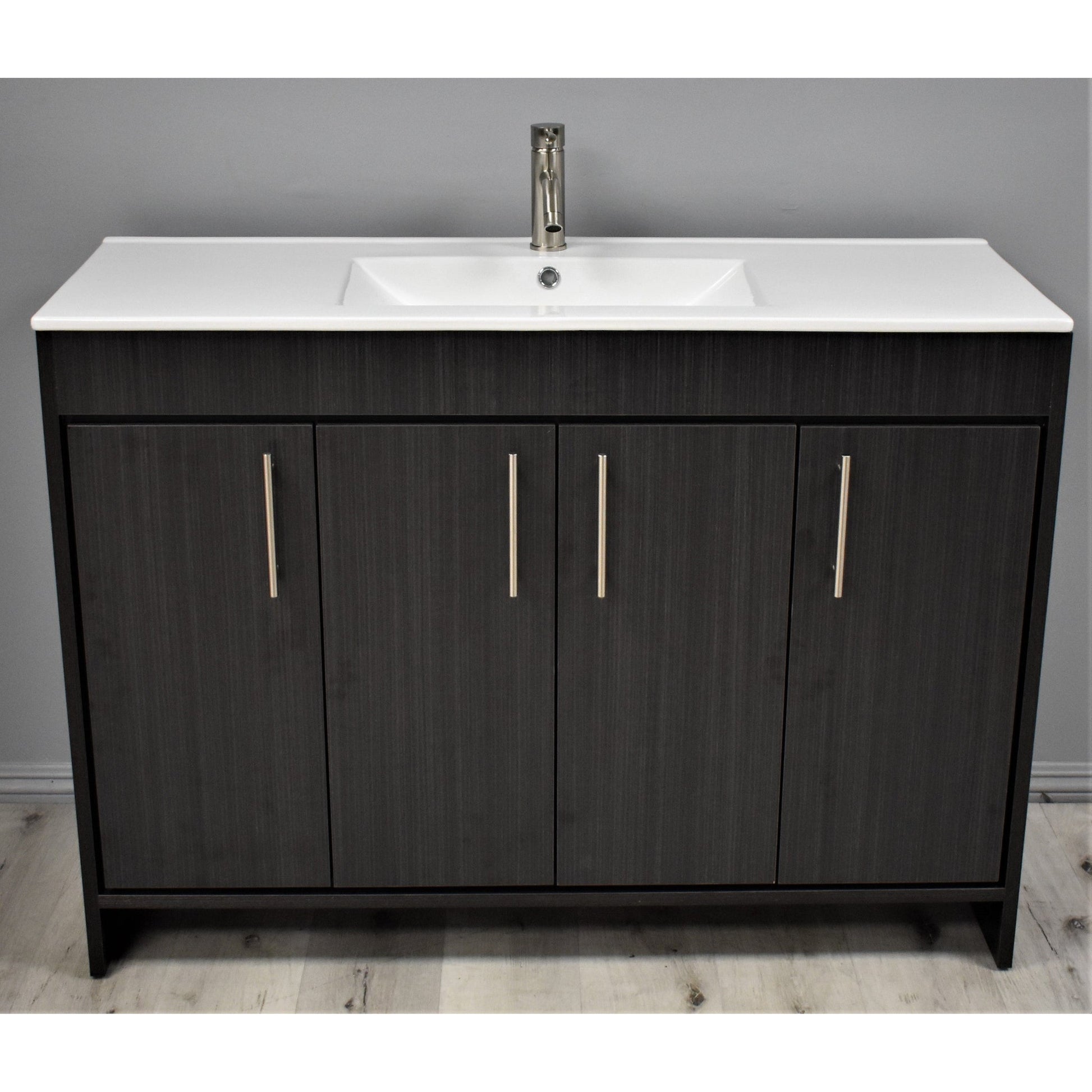 https://usbathstore.com/cdn/shop/products/Volpa-USA-Villa-48-Black-Ash-Freestanding-Modern-Bathroom-Vanity-With-Integrated-Ceramic-Top-and-Brushed-Nickel-Round-Handles-4.jpg?v=1654276934&width=1946